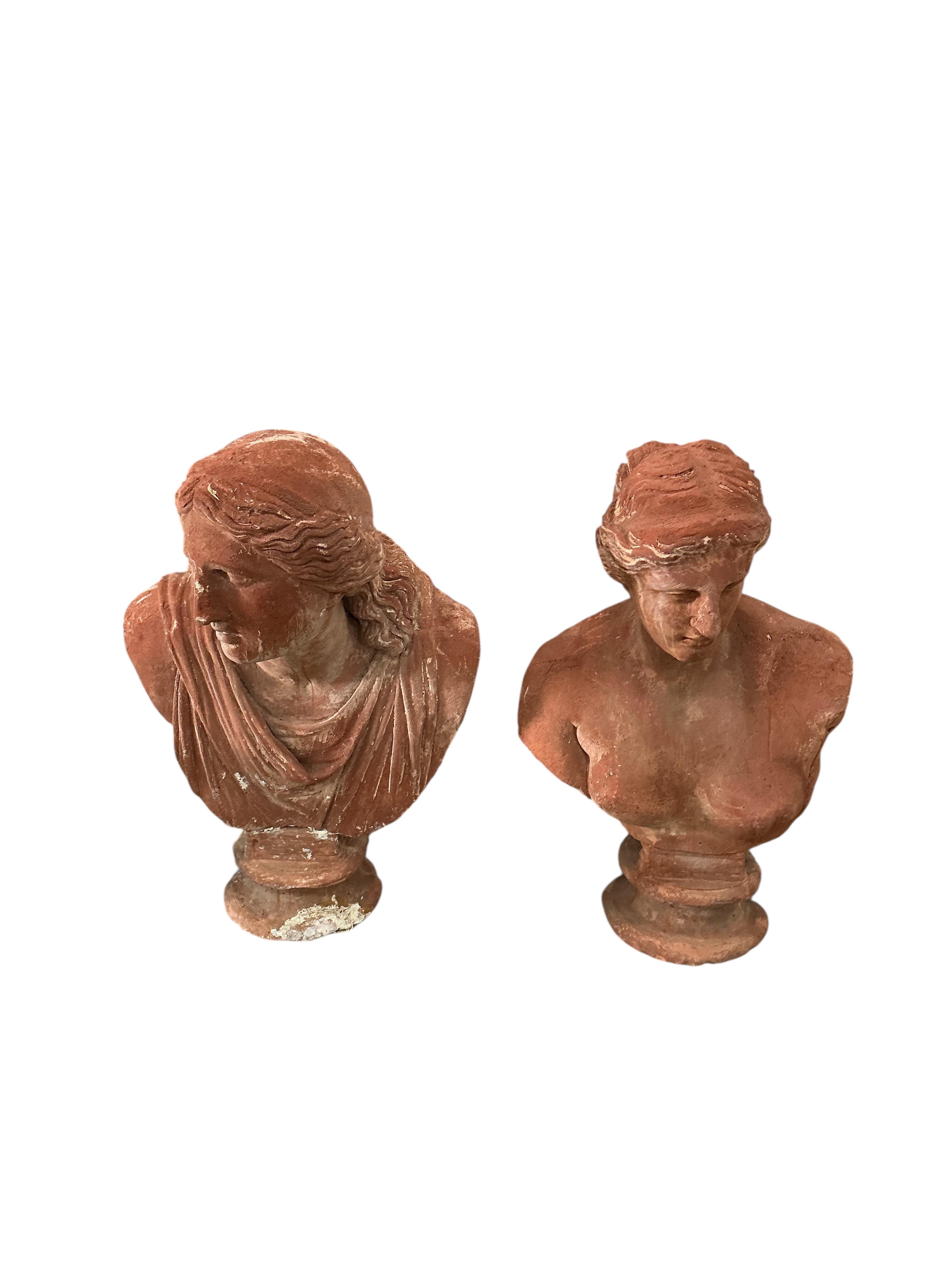 A pair of Neoclassical Revival terracotta busts on fluted pedestals, larger height 188cm, Provenance: The late Kenneth Turner (1936-2025), celebrity florist, designer and perfume retailer, he received the Royal Warrant f